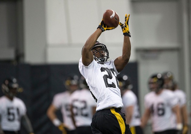Iowa Hawkeyes defensive back Maurice Fleming (28) pulls down a pass during their first spring practice Wednesday, March 26, 2014 at the Hayden Fry Football Complex in Iowa City.  (Brian Ray/hawkeyesports.com)